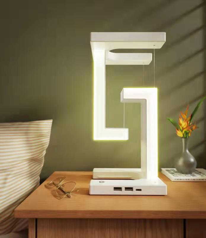 Kreativ trådlös laddare och svävande bordslamp